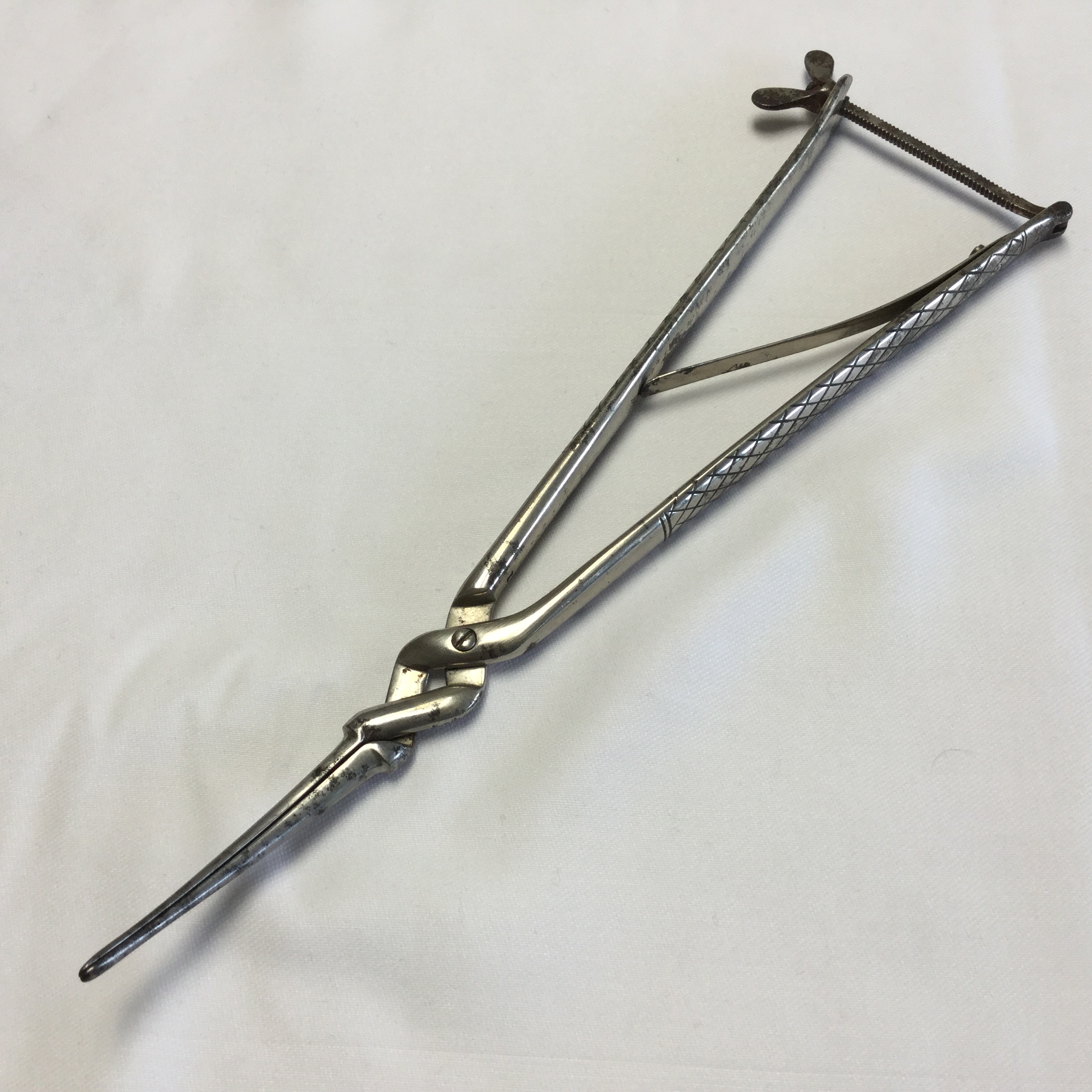 Antique steel cervical dilator Fleaglass