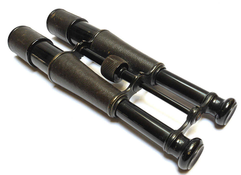 for sale 16 lens twin telescopes, leather covered and with lens shades