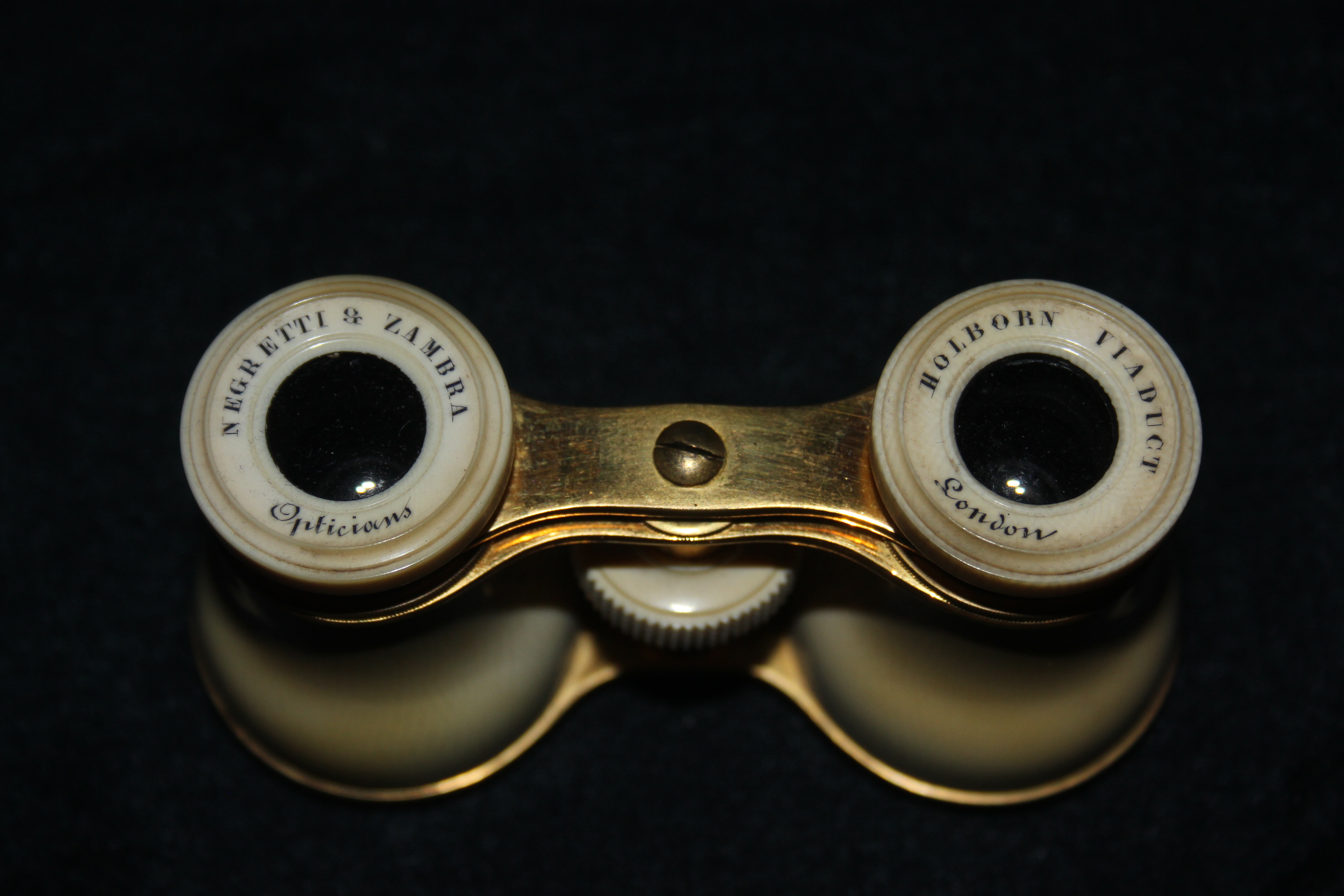 ivory opera glasses by Negretti & Zambra Fleaglass