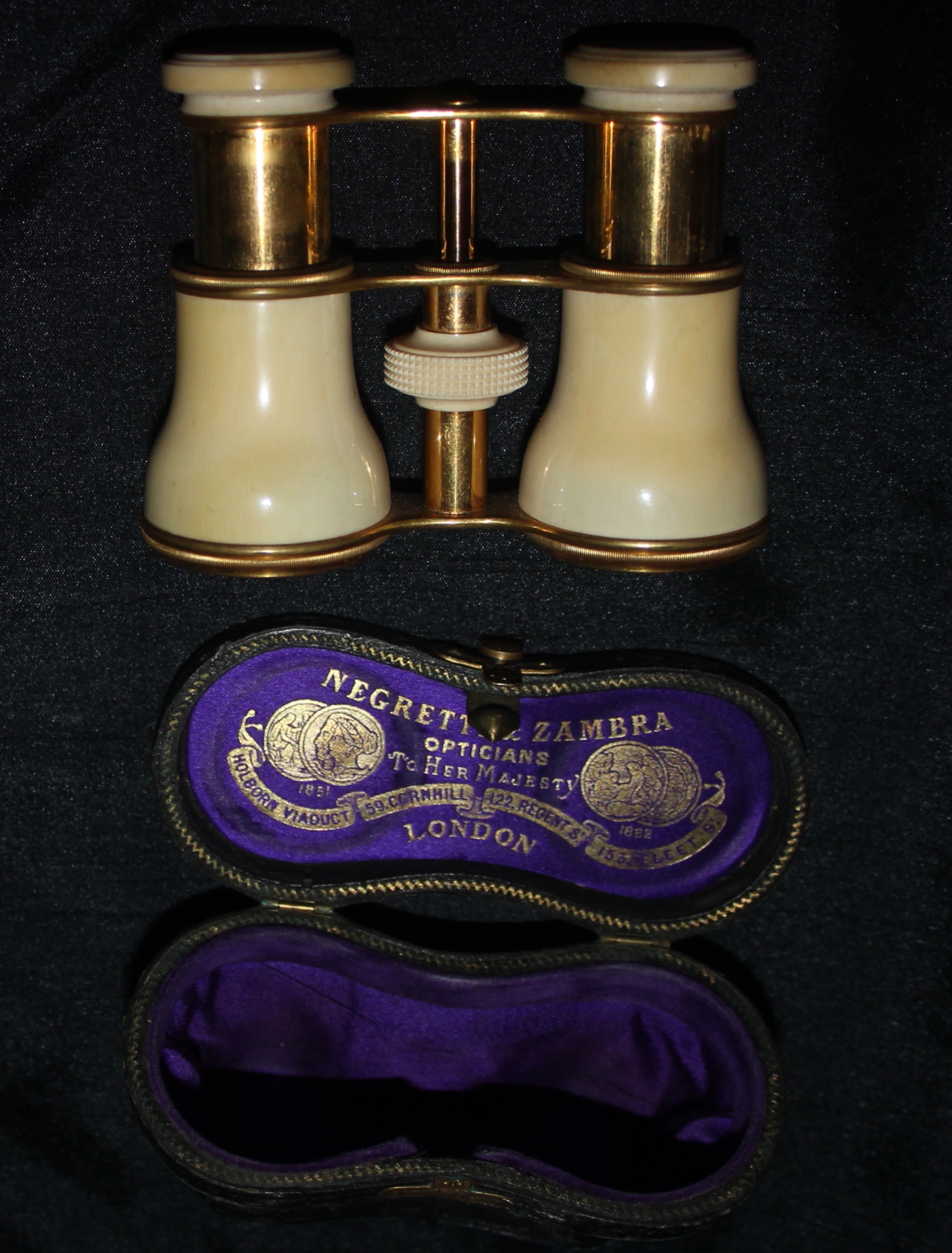 ivory opera glasses by Negretti & Zambra Fleaglass