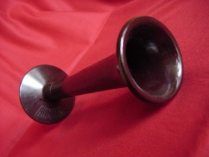An Italian red bakelite monaural stethoscope "Humana"