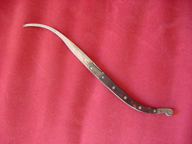 Antique curved bistoury scalpel by Sir Henry a Paris