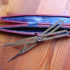 ANTIQUE PROPORTIONAL DIVIDER COMPASS, BY CHARLES SMITH, LONDON, IN ITS RED SHAGREEN CASE