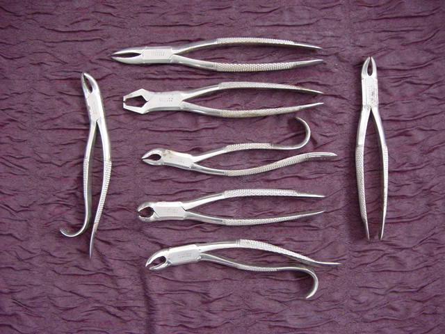 A 1800’s set of 7 dental forceps by J. Biddle, NY