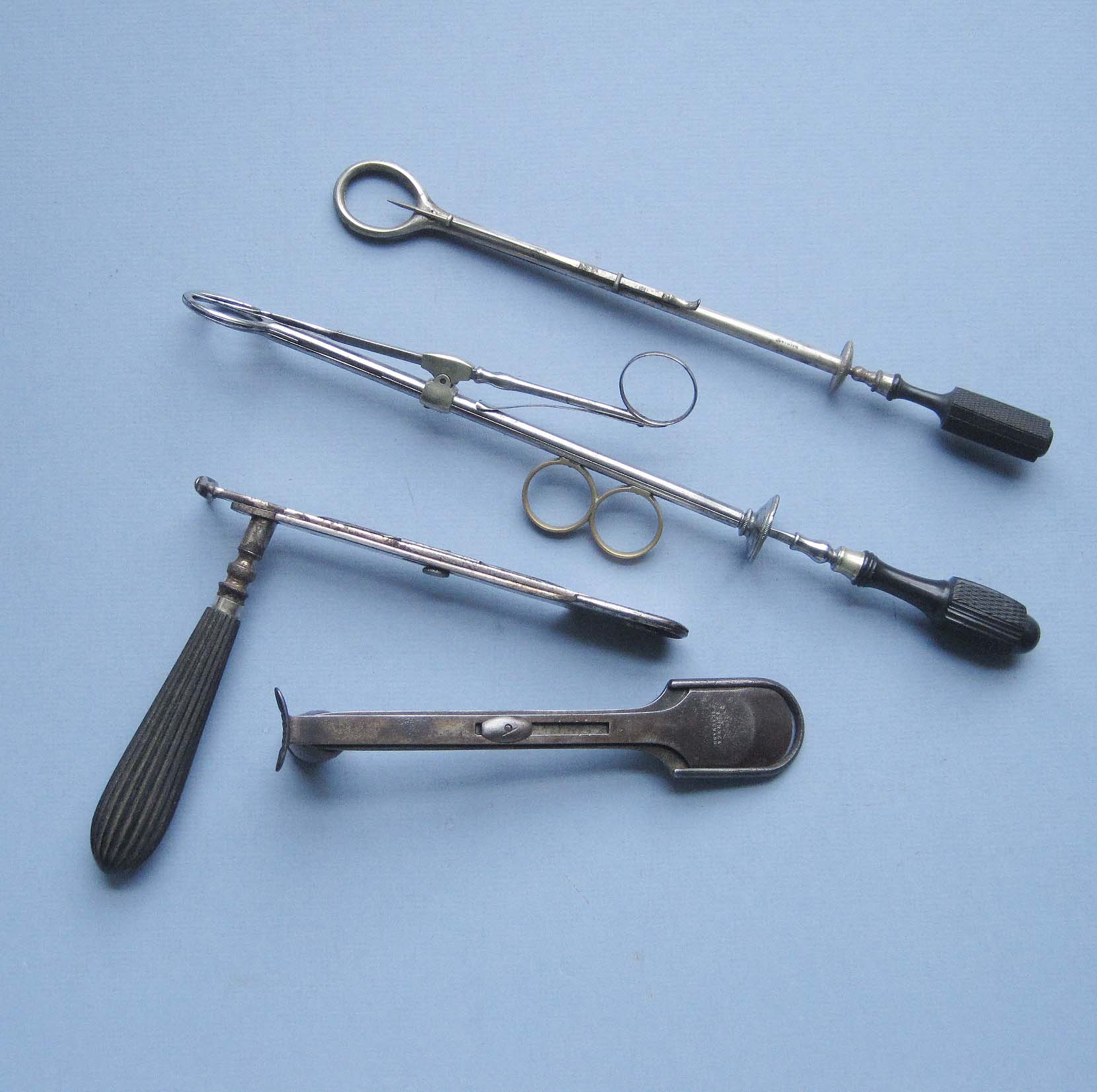 FOUR 19TH-CENTURY TONSIL GUILLOTINES