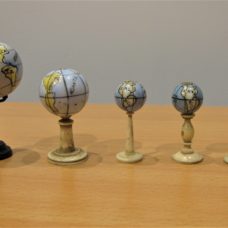 Collection of 5 porcelain miniature globes, early-mid 19th century