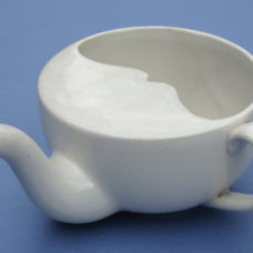 INVALID FEEDER, English, c. 1920, “W. Adams & Co. 1917,” soft-paste porcelain cup 4-5/8″ (12 cm) in diameter, with spout and side handle, very fine.