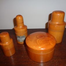 3 Boxwood bottle holders and 1 boxwood receptacl