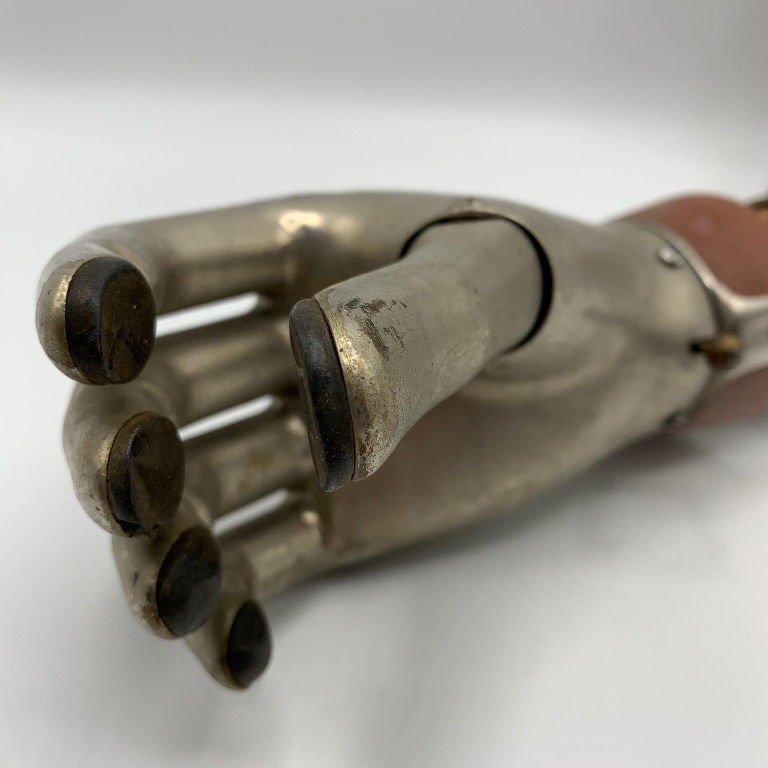 A rare Austrian prosthetic arm with metal hand, marked