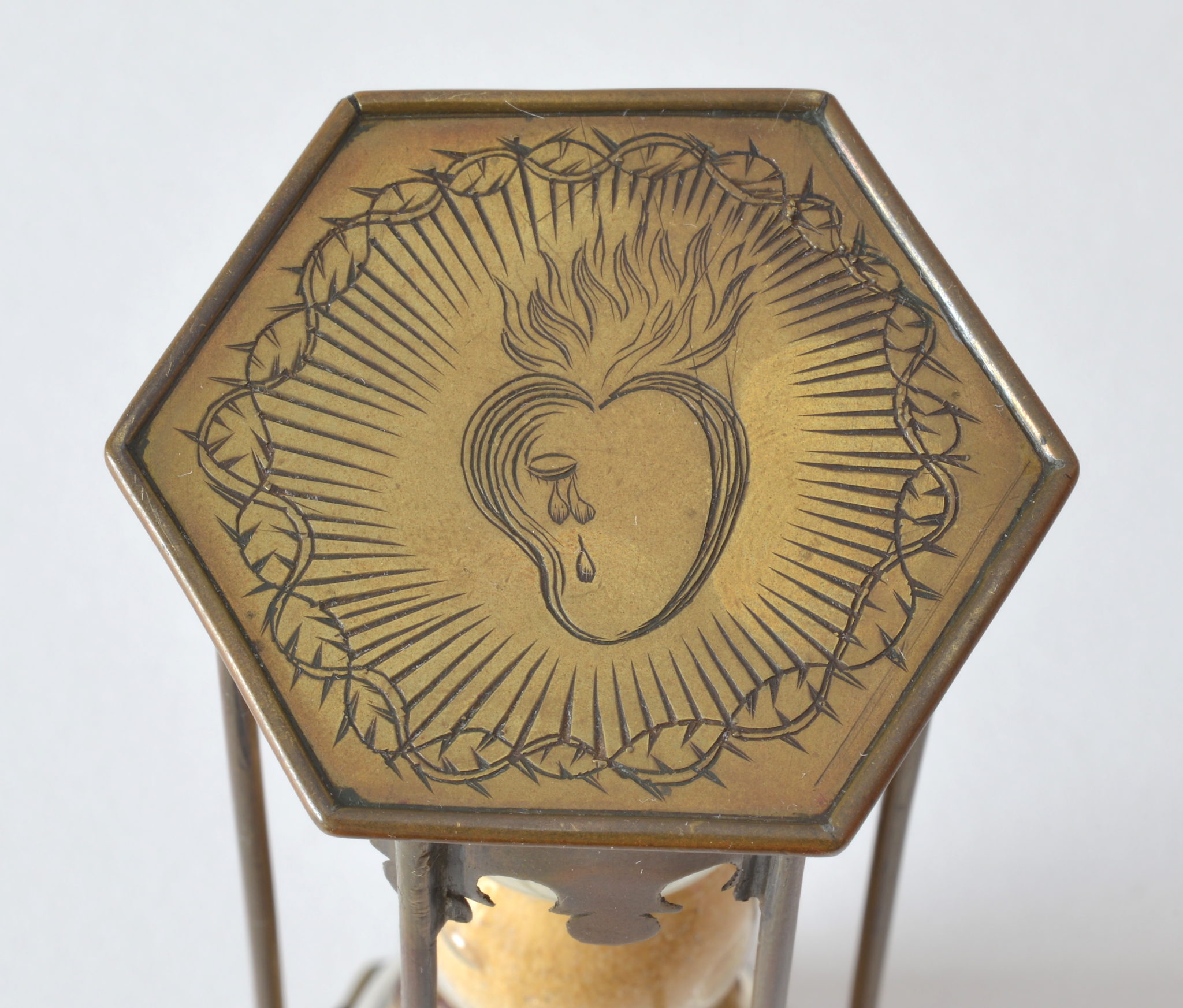 Brass hourglass with special heart decors made in France circa 1680