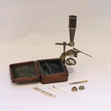 A miniature box-mounted Gould-type microscope, circa 1820s’