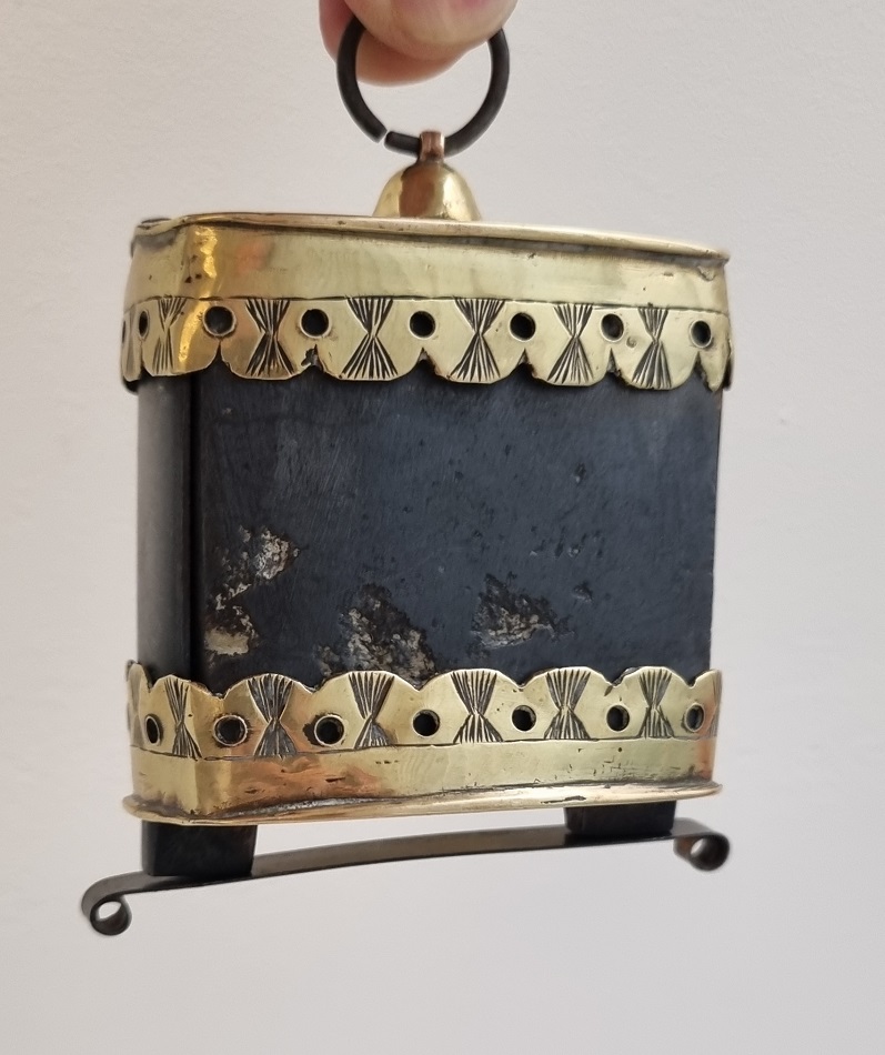 A lodestone or natural magnet mounted in brass, France, early 18th century