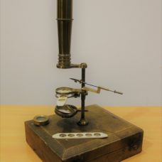 A superbly cased in green leather lined in velvet Dollond Gould-Type Microscope Circa 1820