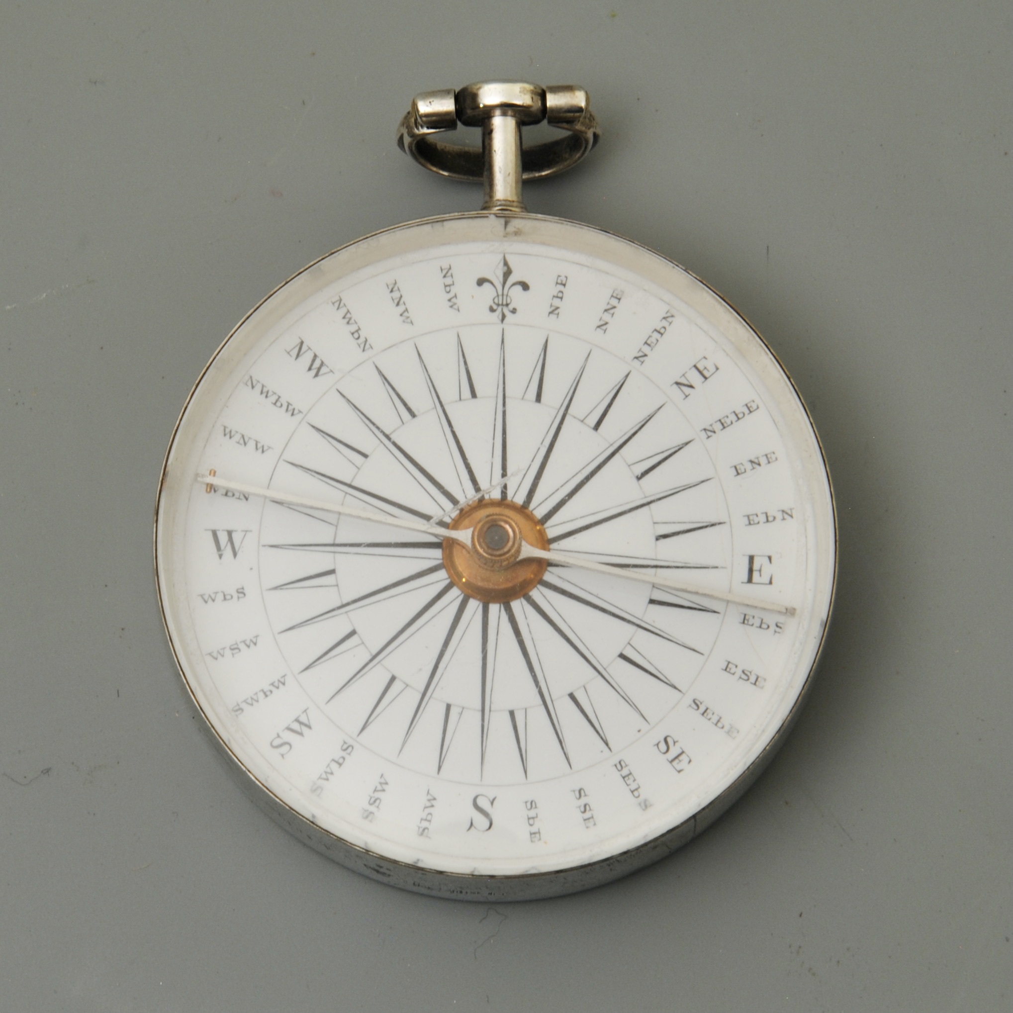 Silver pocket compass by J&W Watkins