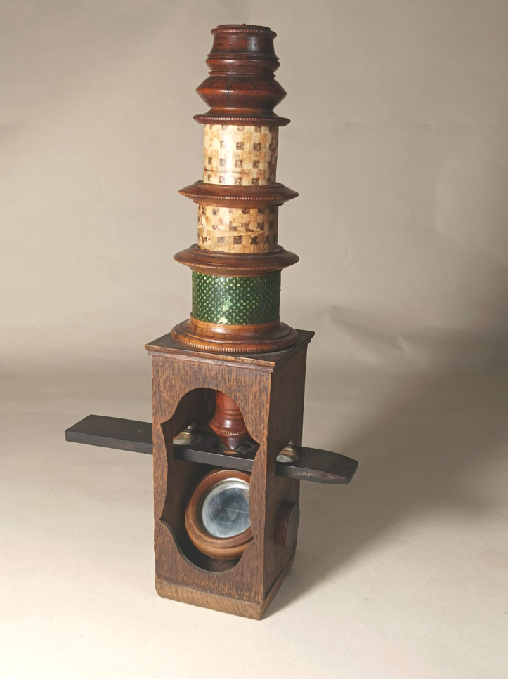 A GOOD WOODEN NUREMBERG MICROSCOPE