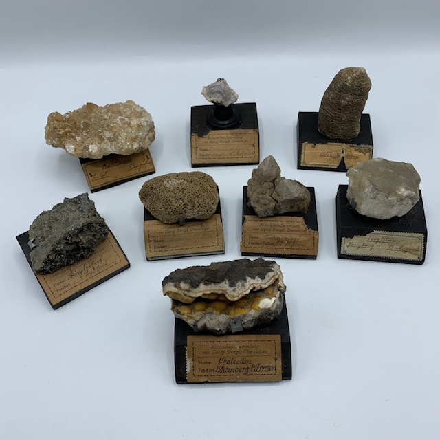 Collection of 8 minerals on wooden bases,
