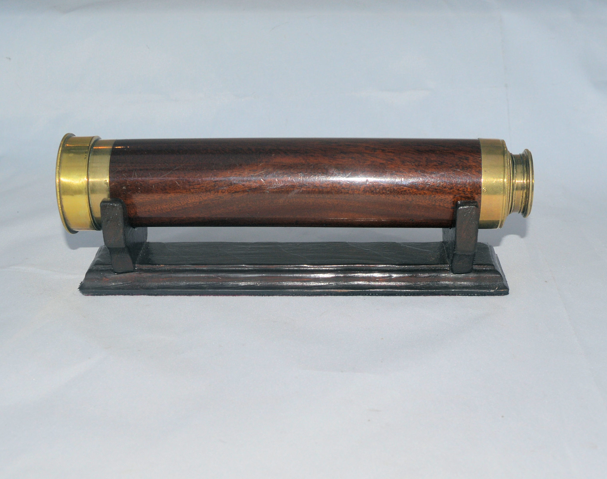A good 3 draw telescope, double signed.