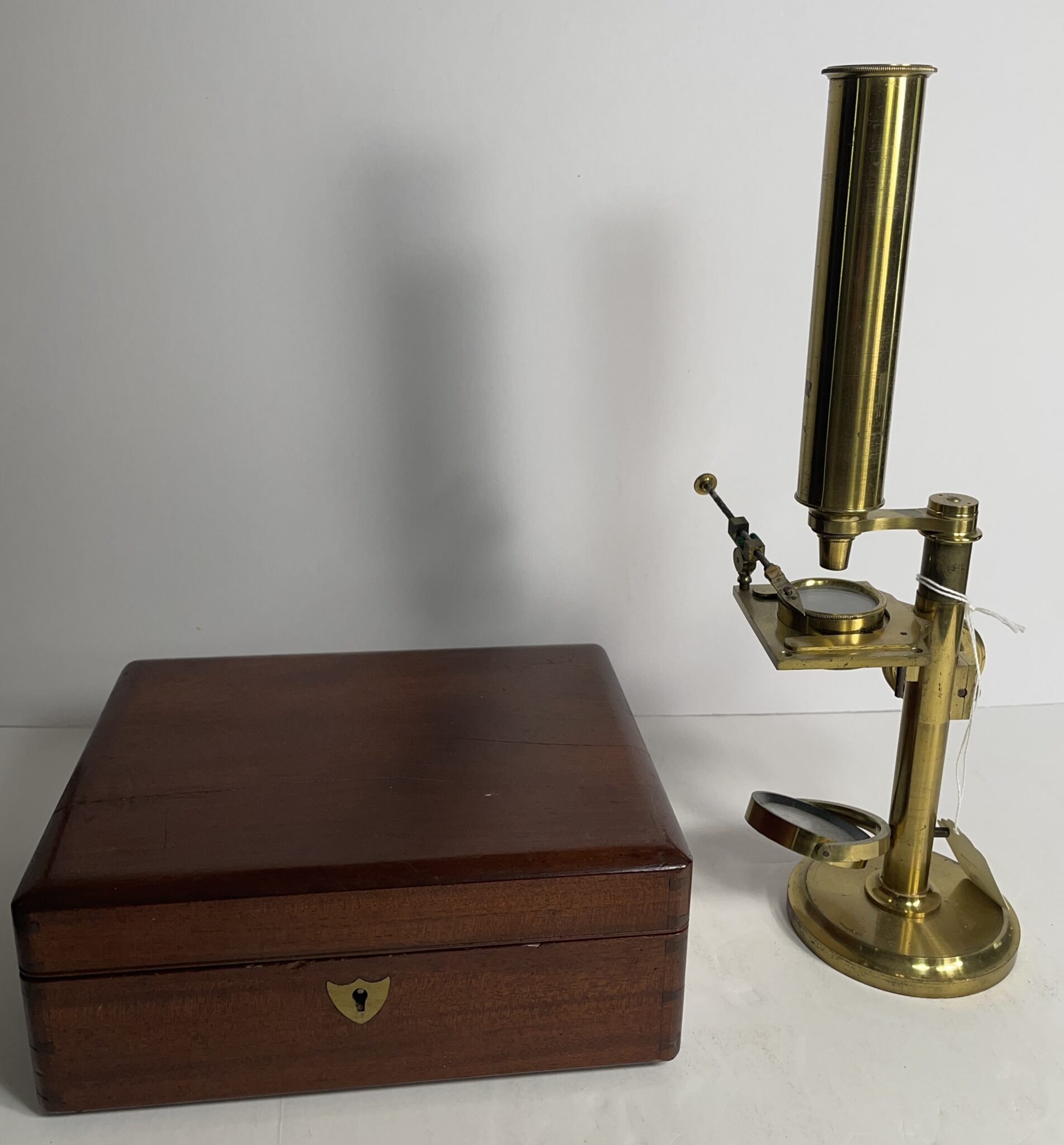 Signed Robert Brettell Bate Microscope with case and accessories.