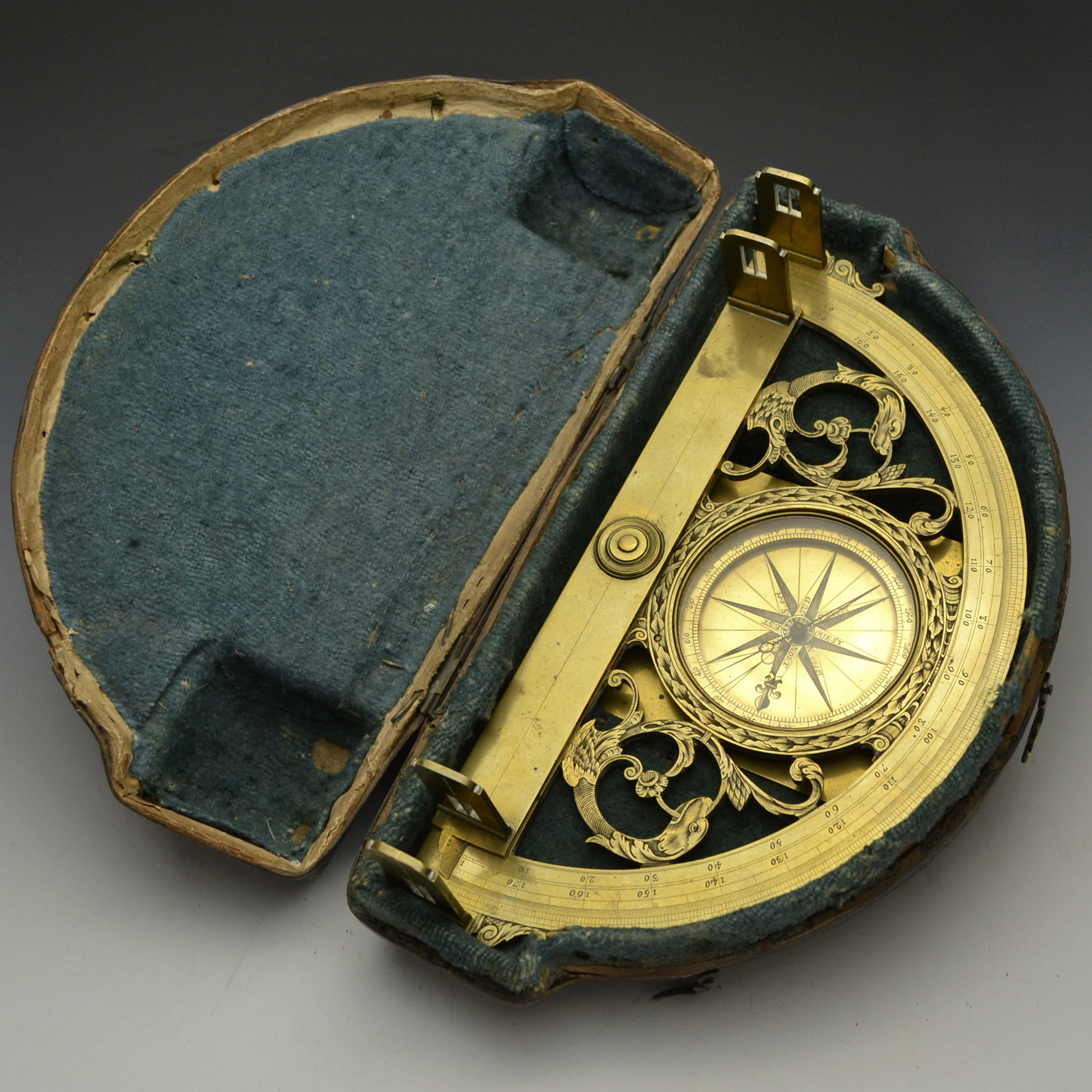 A museum quality 17th century cased Graphometer decorated with gargoyles