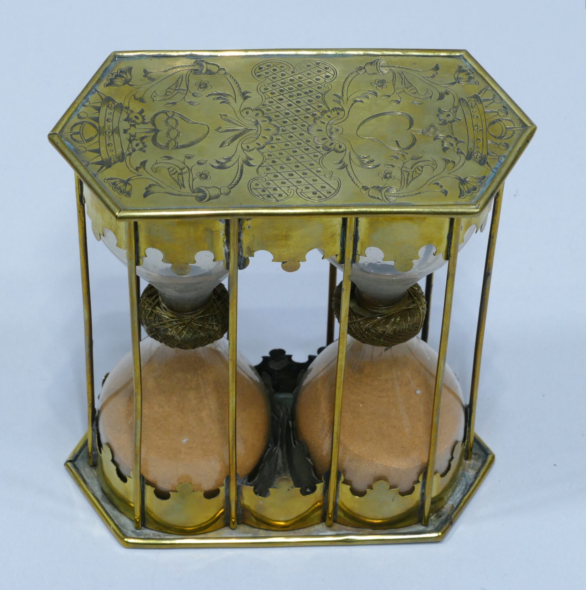 17th century brass double hourglass made for an ecclesiastic