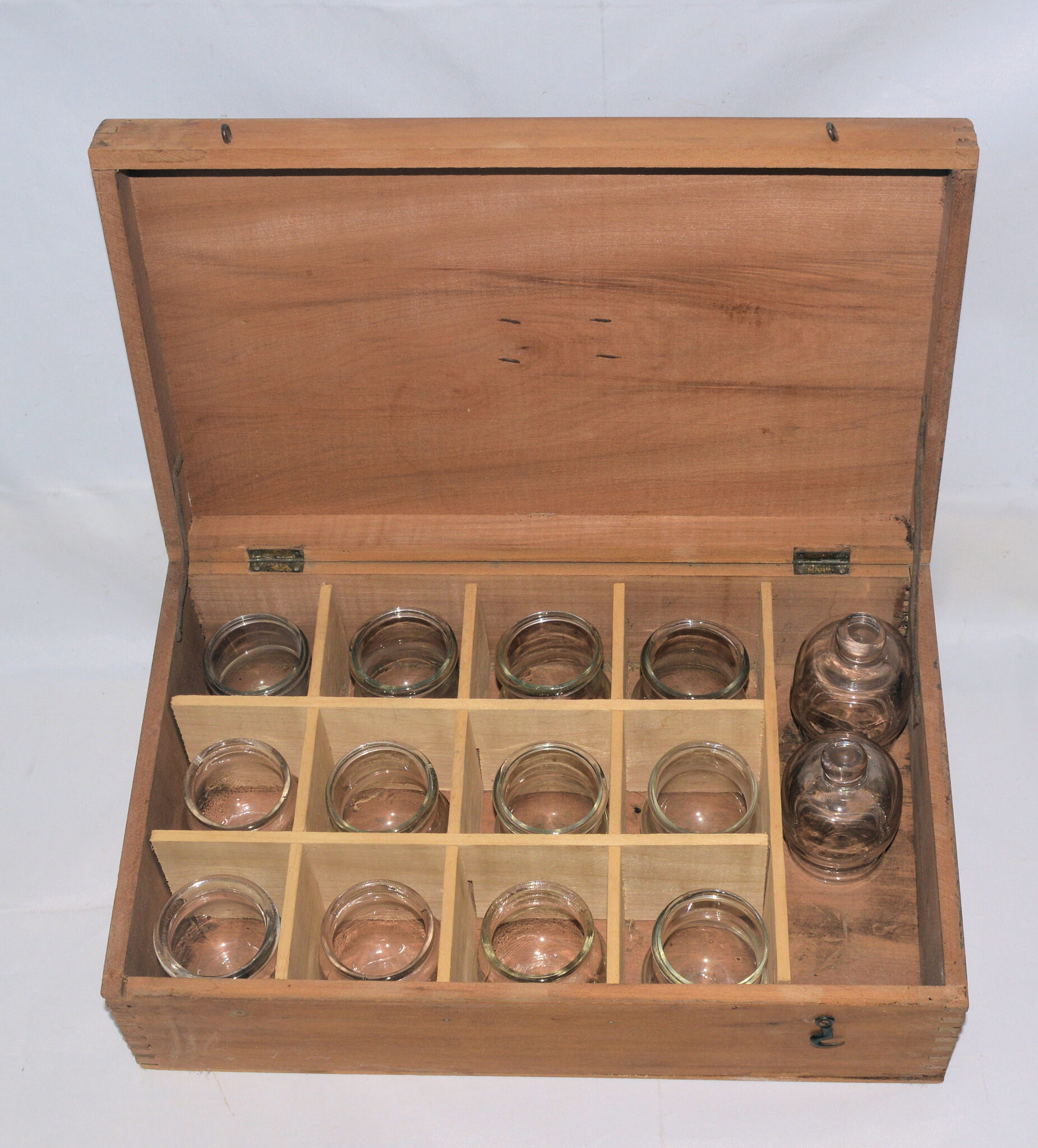 Blood cupping glasses in case.