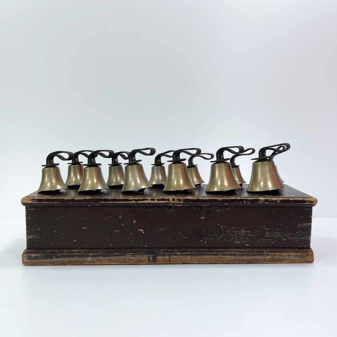 Late Victorian Cased Set of Twelve Handbells by Warners of London