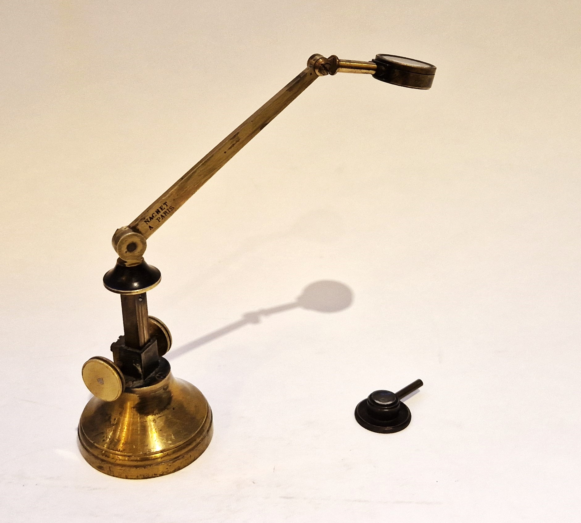 Rare simple microscope with articulated arm by Nachet with two eyepieces, circa 1900