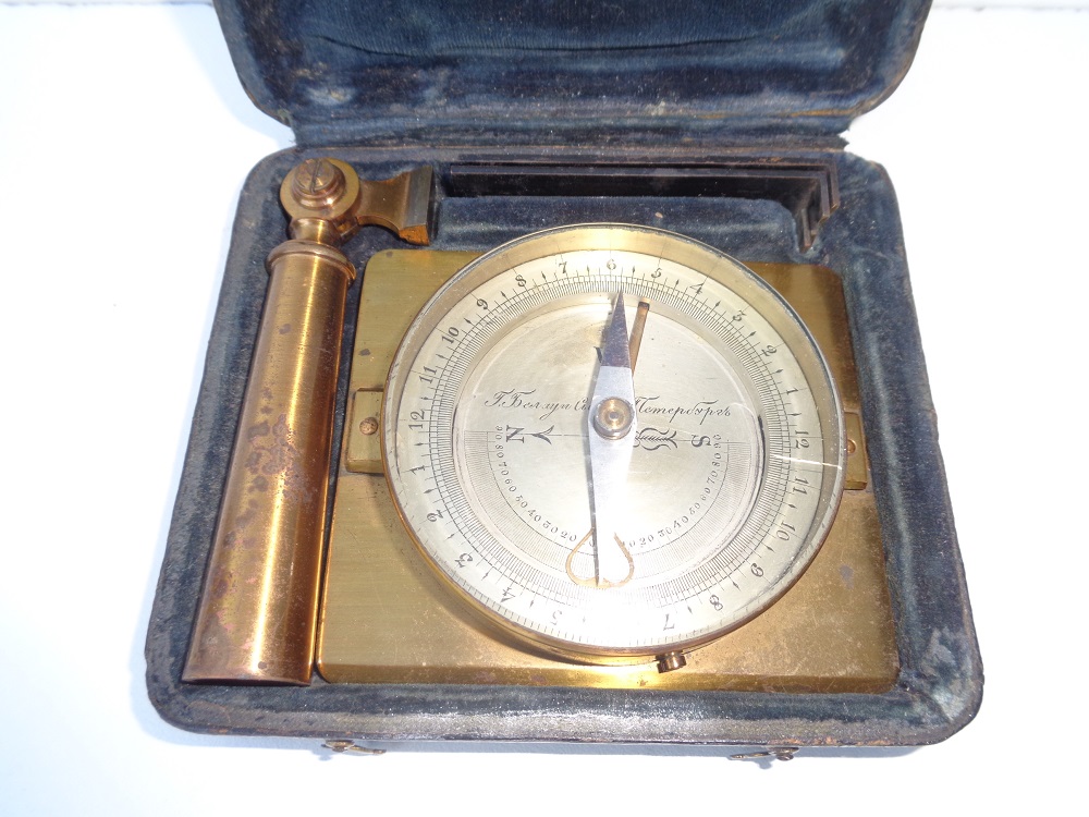 A 19th century travel compass with inclinometer, beautifully signed
