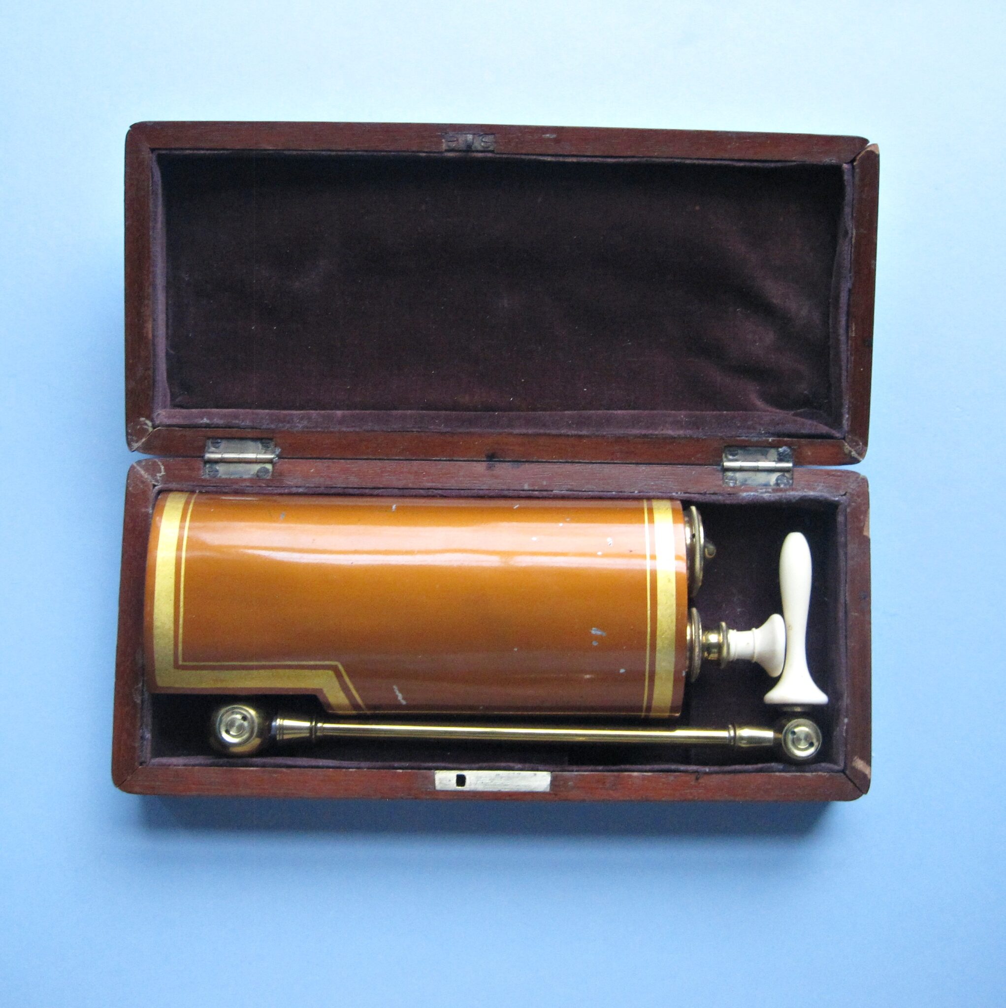 C1860 Japanned Double-Action Reservoir  Enema Syringe