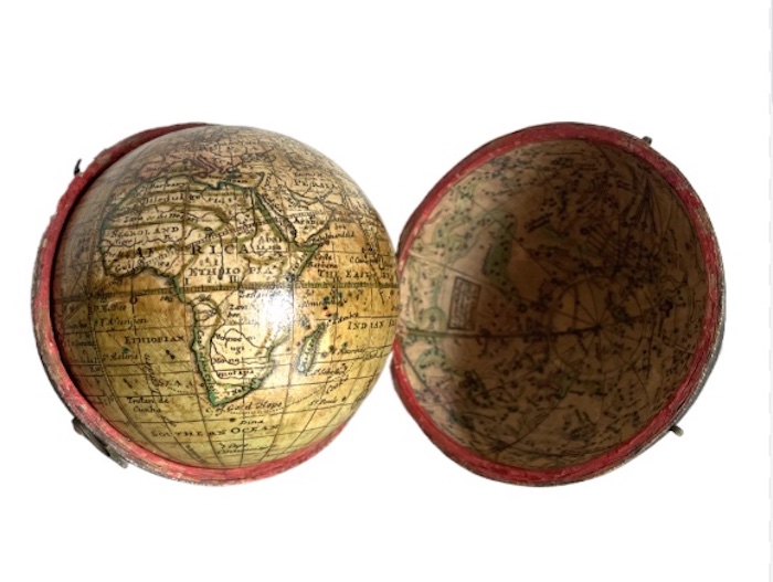A 2 3/4 Inch Pocket Globe after Moll C 1770 in fish-skin case