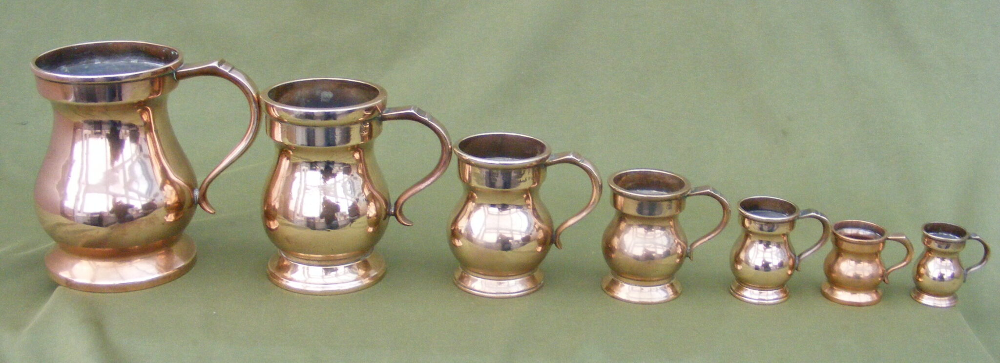 FINE SET OF VICTORIAN GUNMETAL PUBLIC HOUSE MEASURES