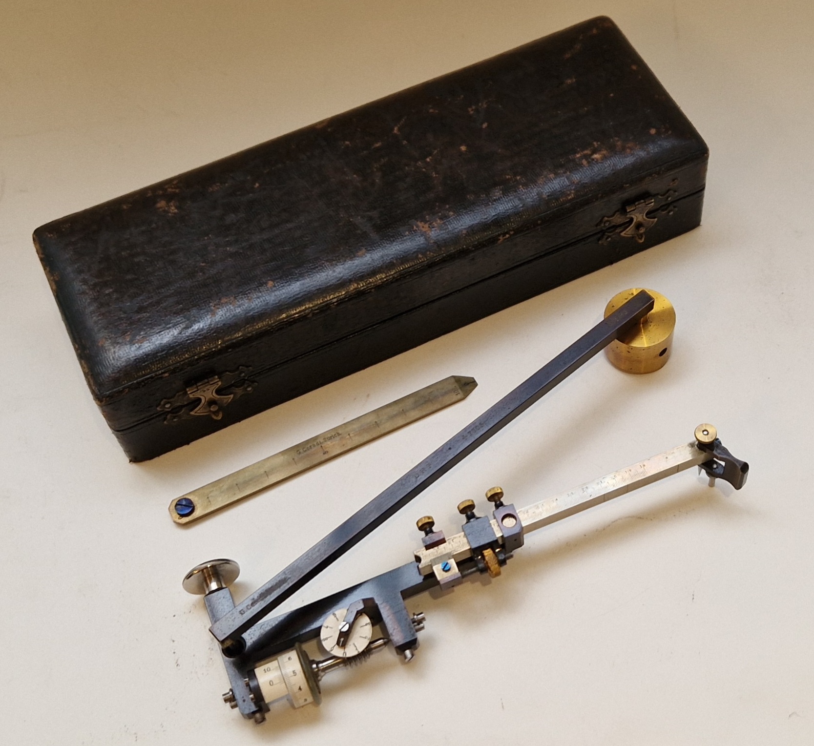 A very early compensating polar planimeter dated 28 november 1894 and signed by Coradi