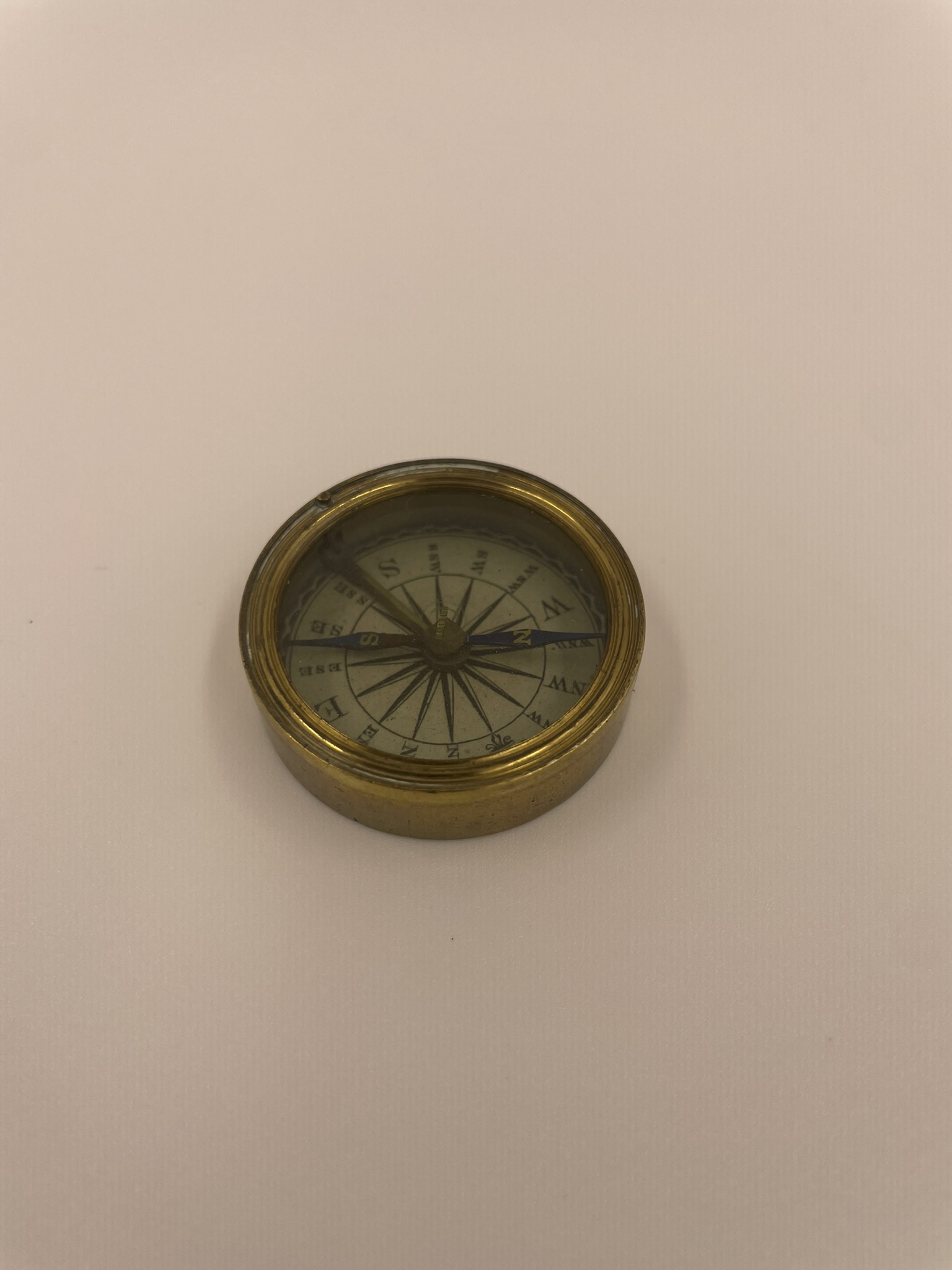Small brass antique pocket compass