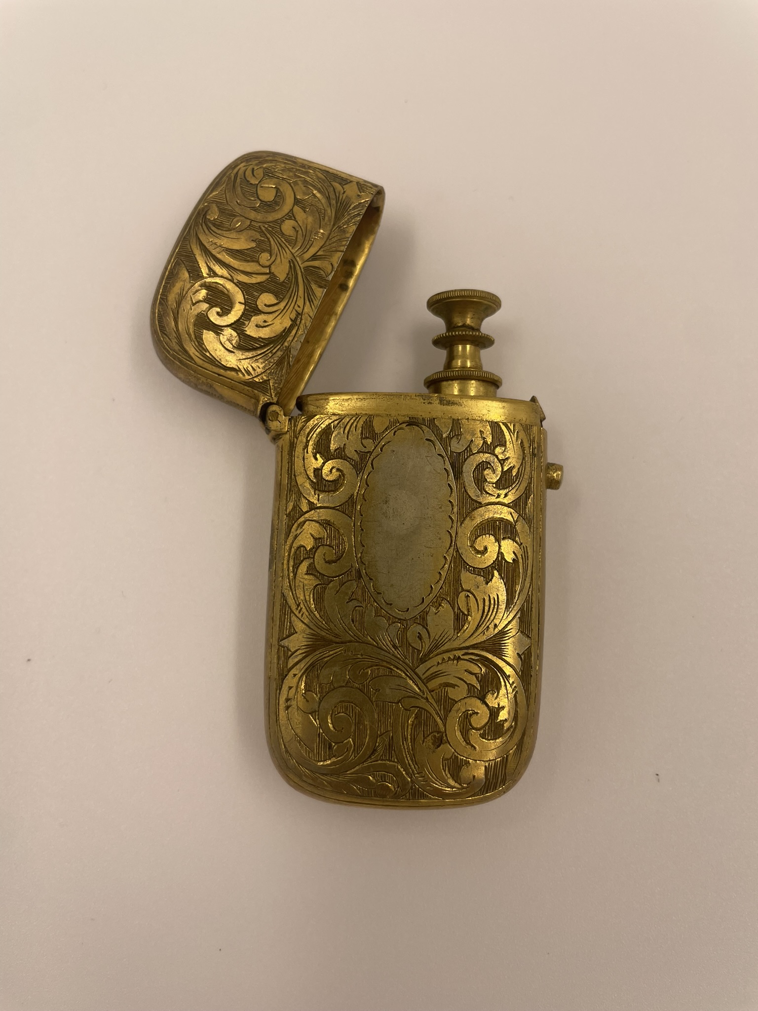 Ornate antique brass personal opiate syringe case with syringe