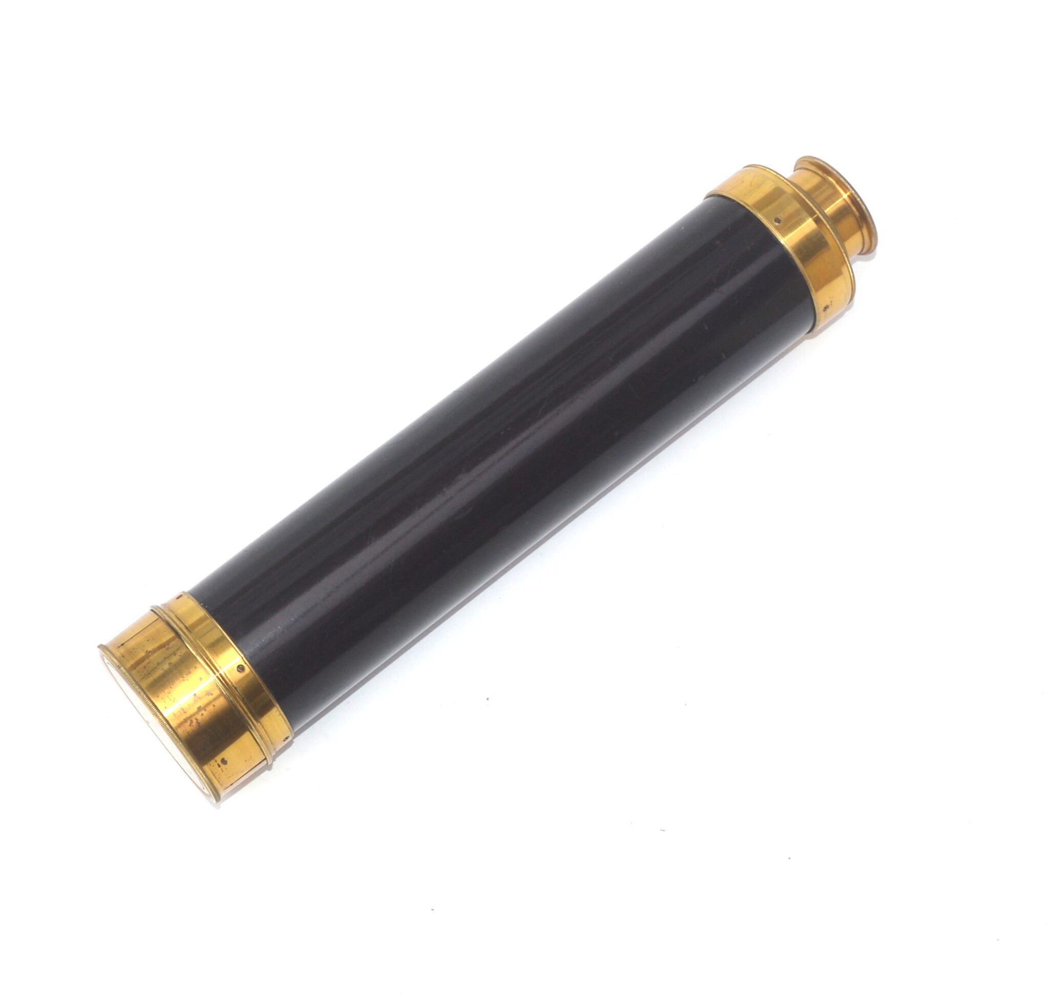 A large hand held telescope by Dollond.