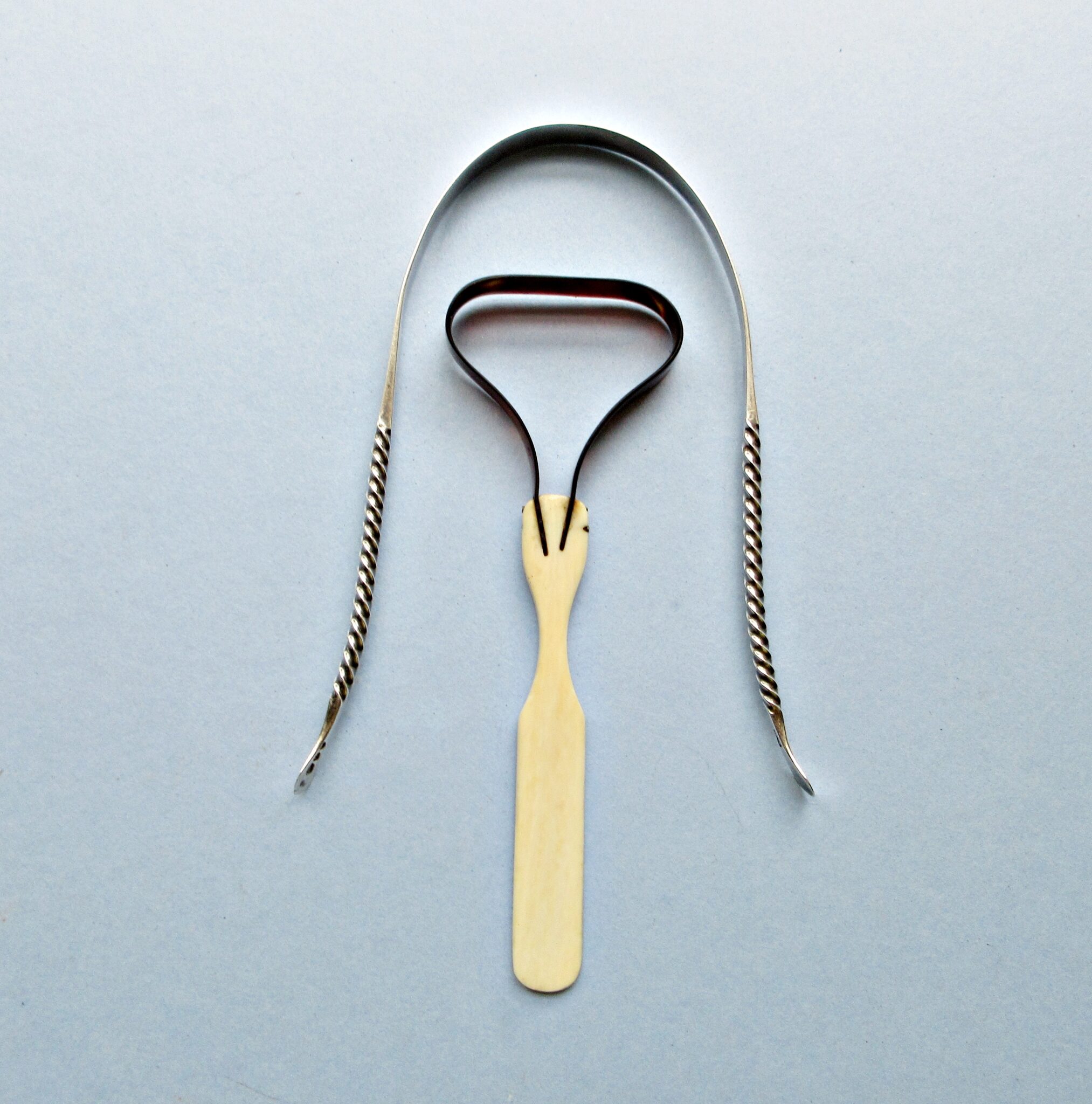 Two 19th-Century Tongue Scrapers