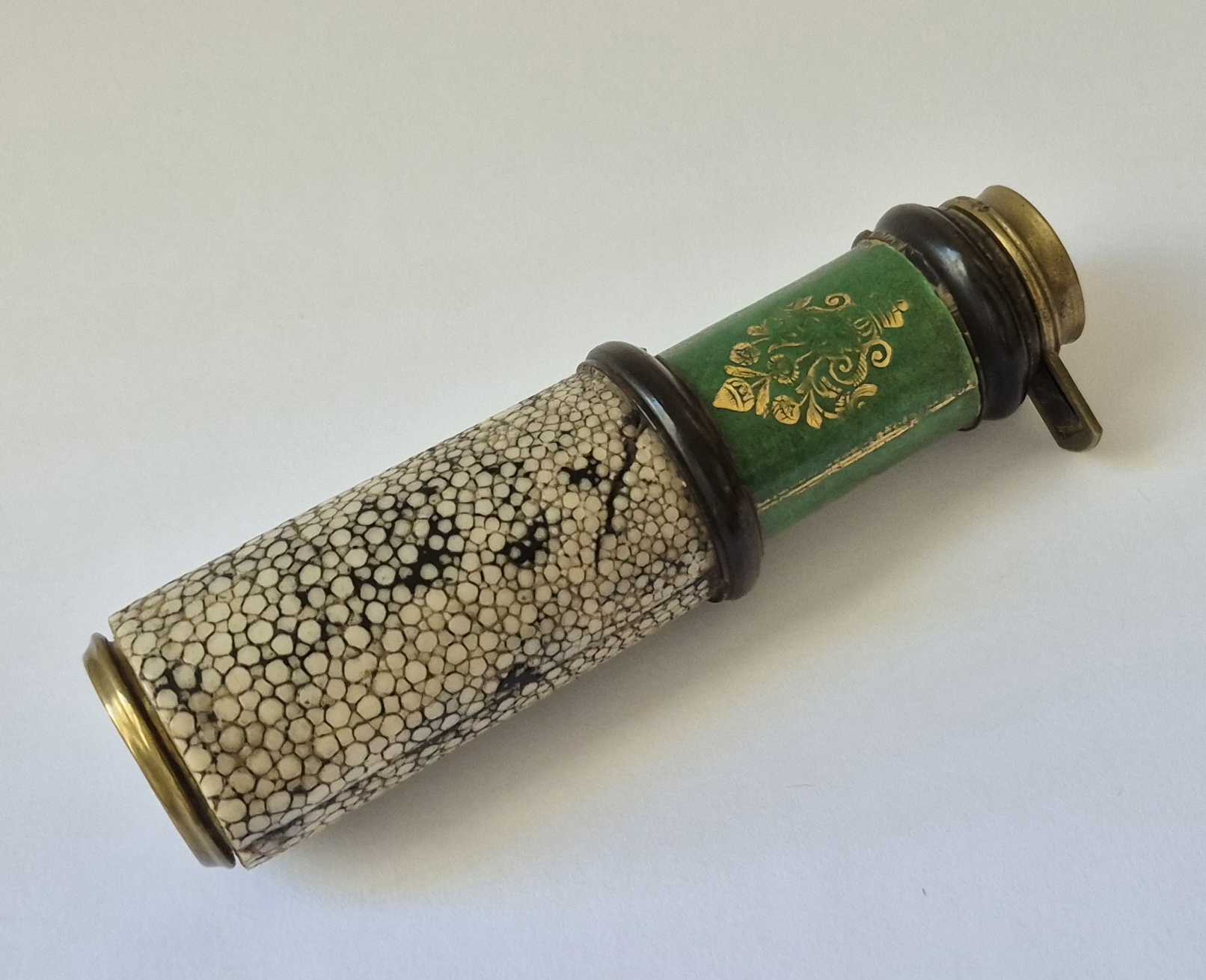 A fine pocket spyglass in withe galuchat en gilded green vellum, circa 1740