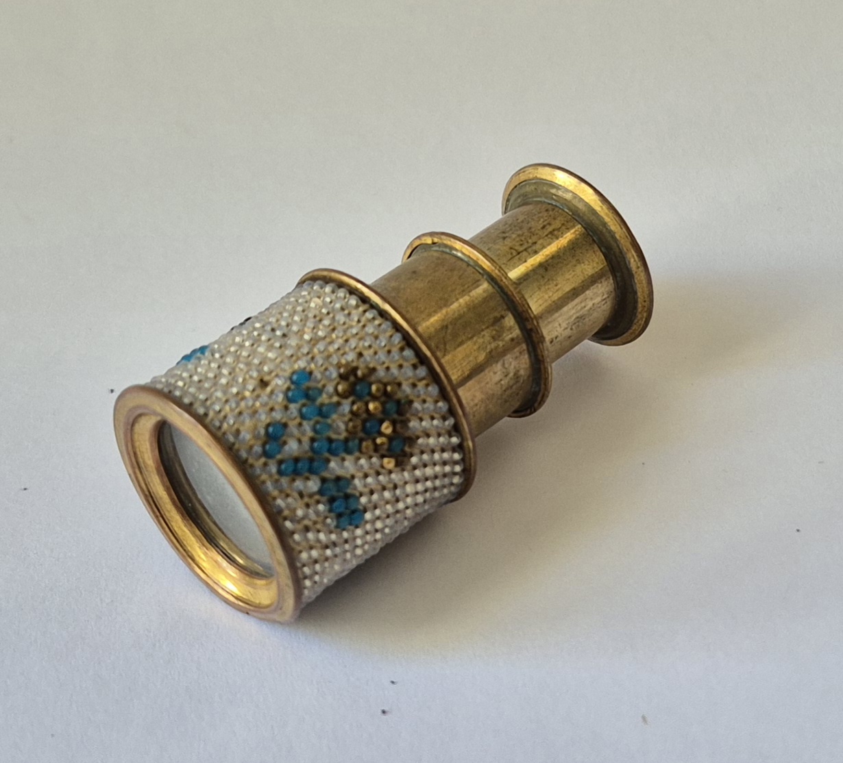 A Miniature pearl spyglass forming pendant, 19th