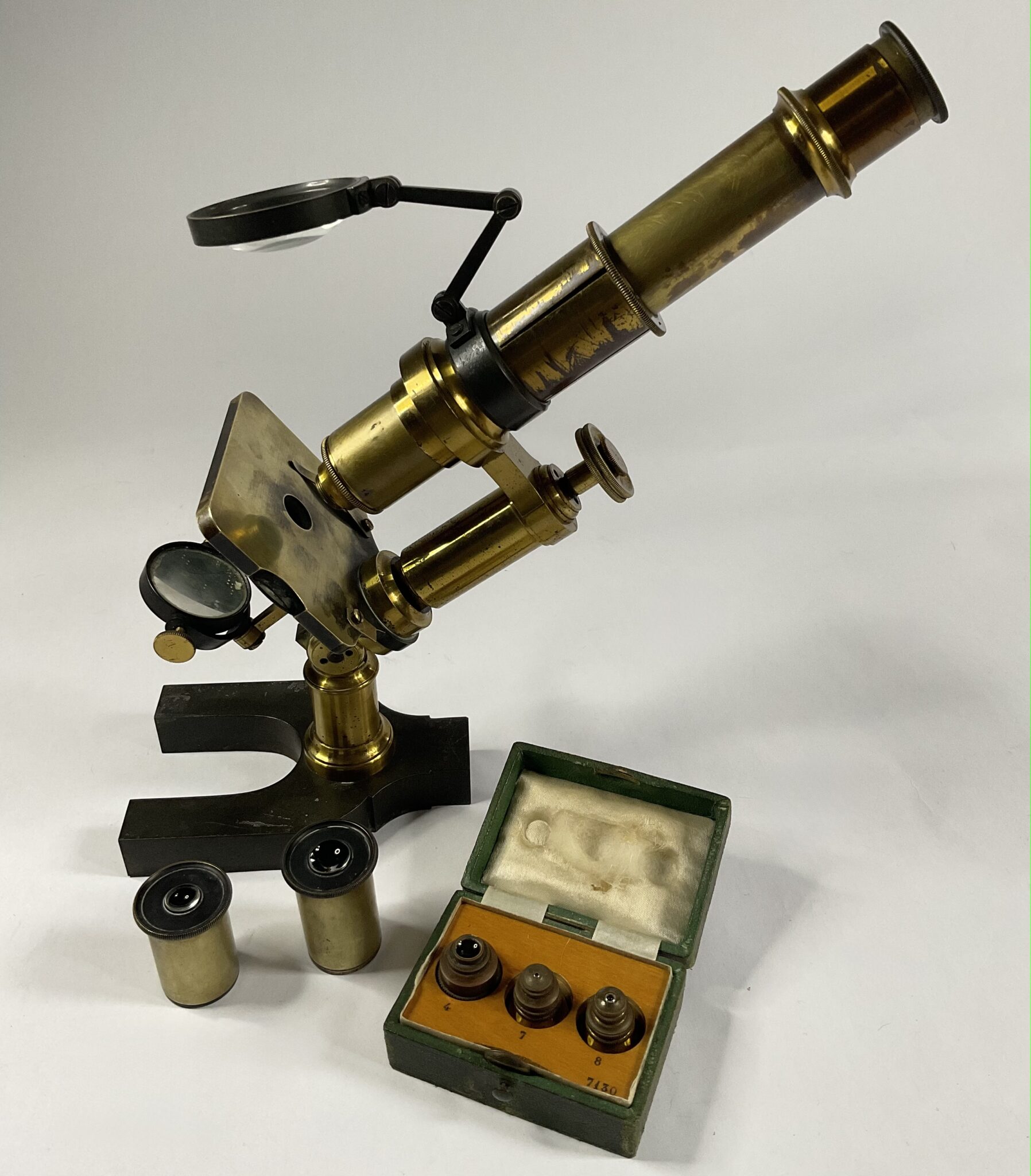 Antique French microscope with case and accessories, 1870.