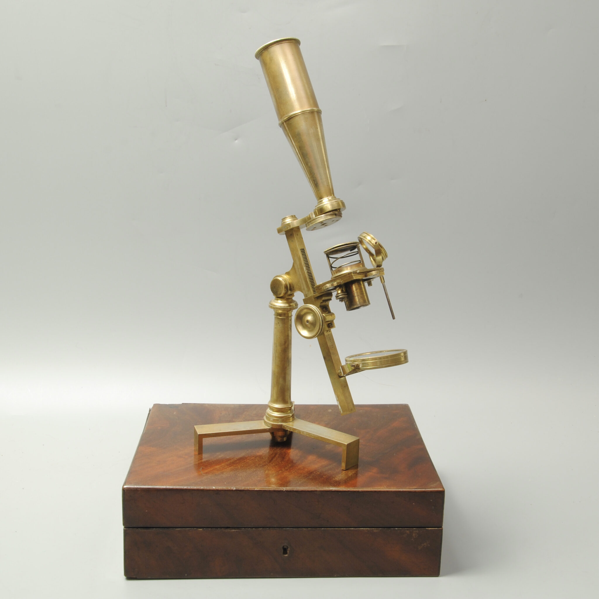 A small Jones most improved microscope by Hillum, London