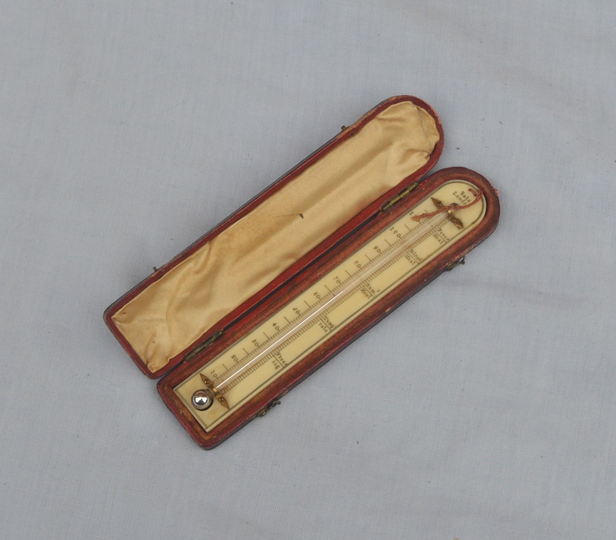 Small portable thermometer in case – Bate, London.