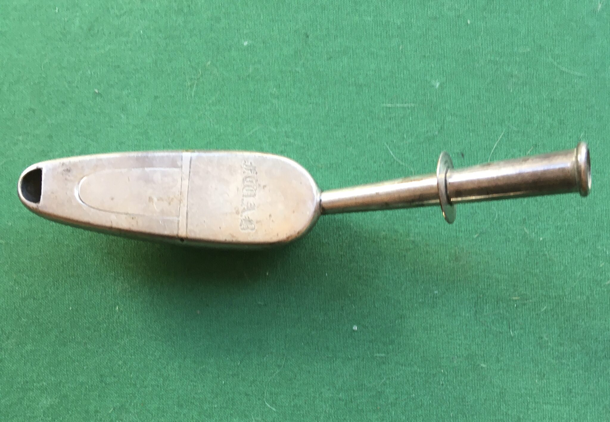 A Silver Coloured Metal Gibson Spoon