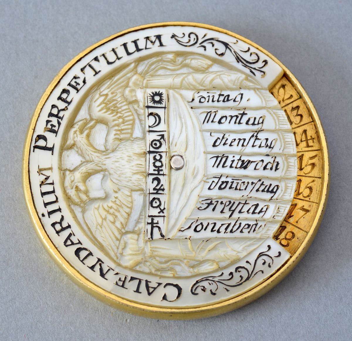 Perpetual calendar in mother-of-pearl and gilded brass made in Germany at the early 19th century