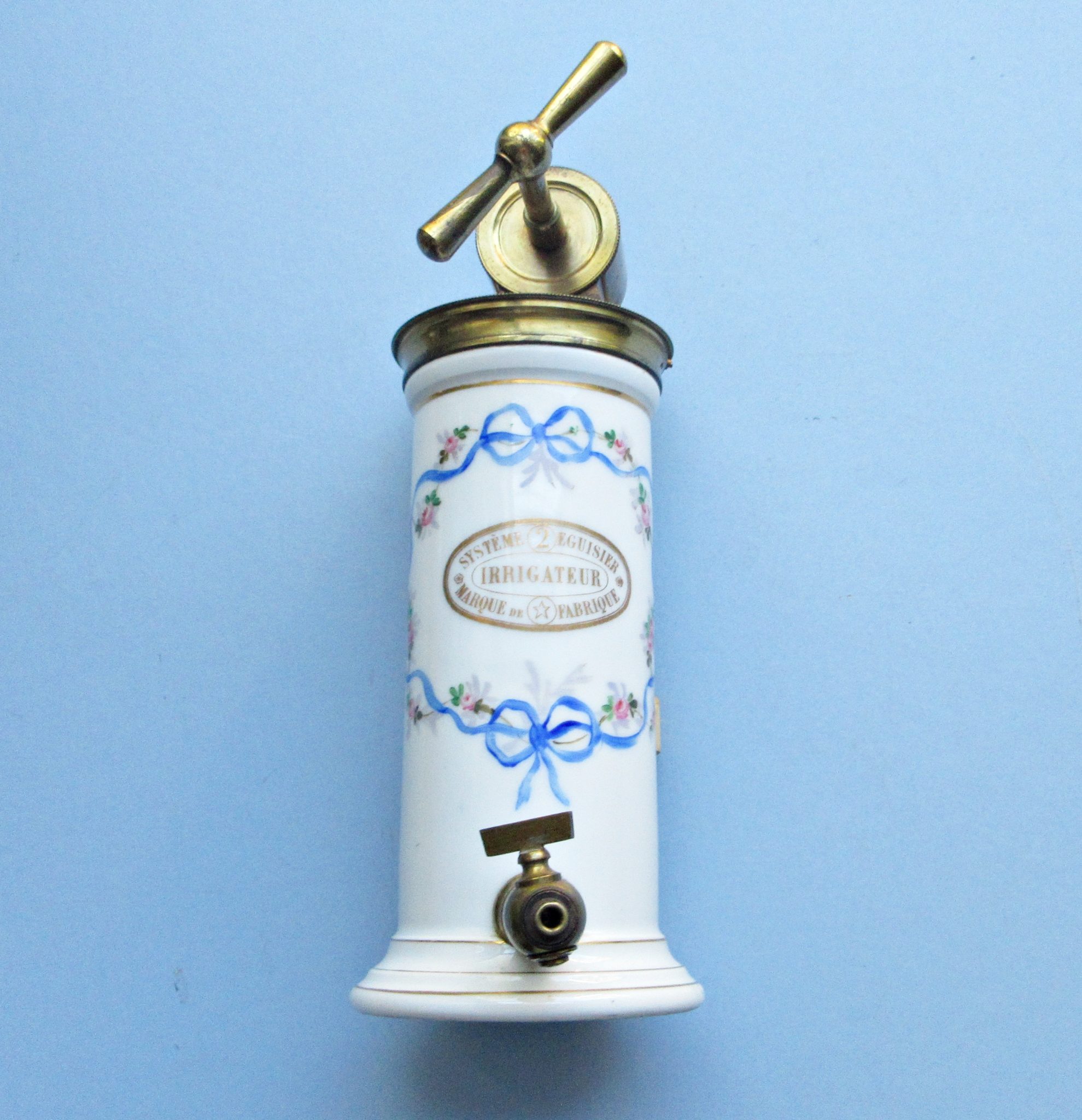 Egusier Douche/Enema : porcelain with floral decoration