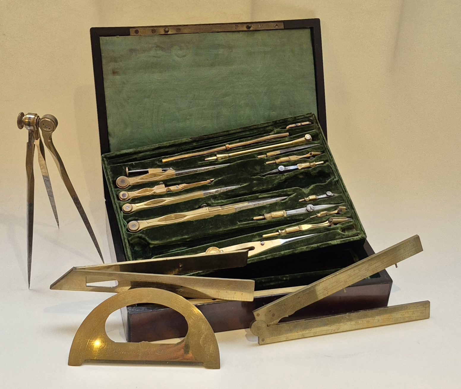 A drawing or mathematical set with three-legged dividers by Carochez in Paris, circa 1800