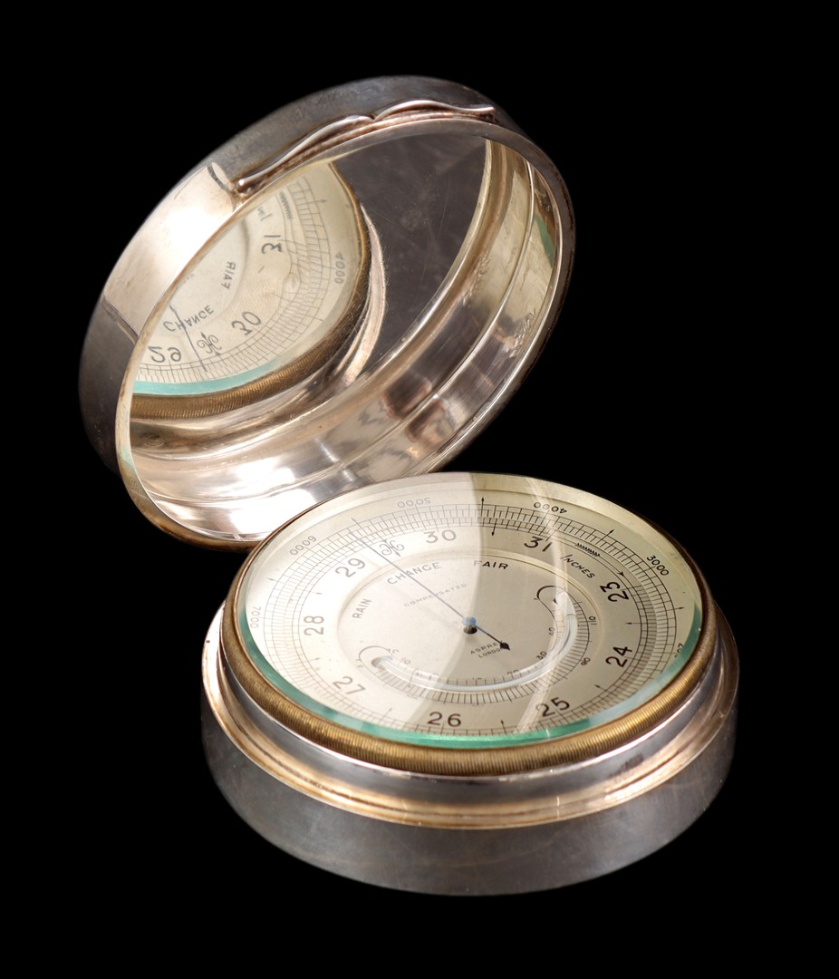 Silver case barometer by Aspreys London
