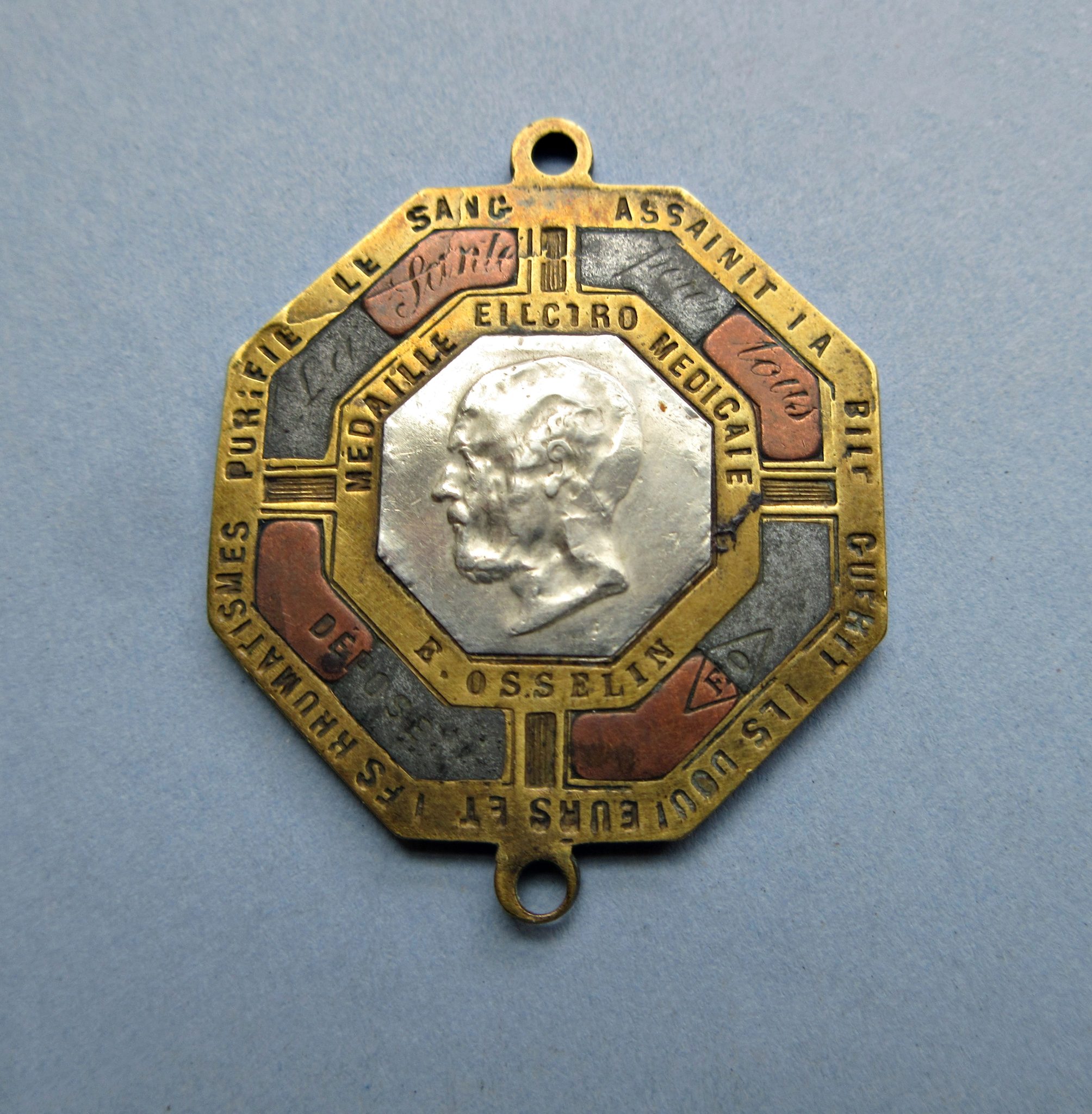 Galvanic pendant, various metals, by E. Osselin, French, 1880-1920