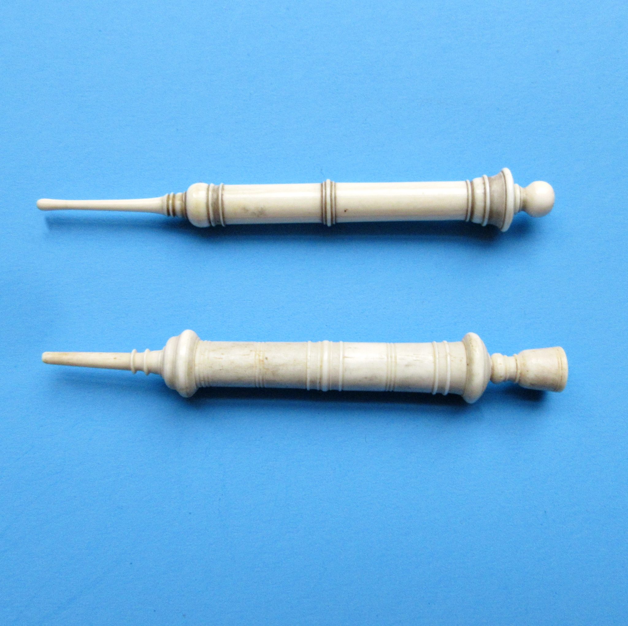 Two Early-18th-Century Bone Syringes