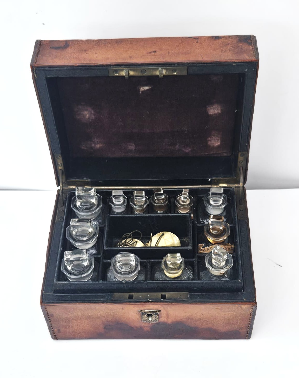 Apothecary cabinet and contents.