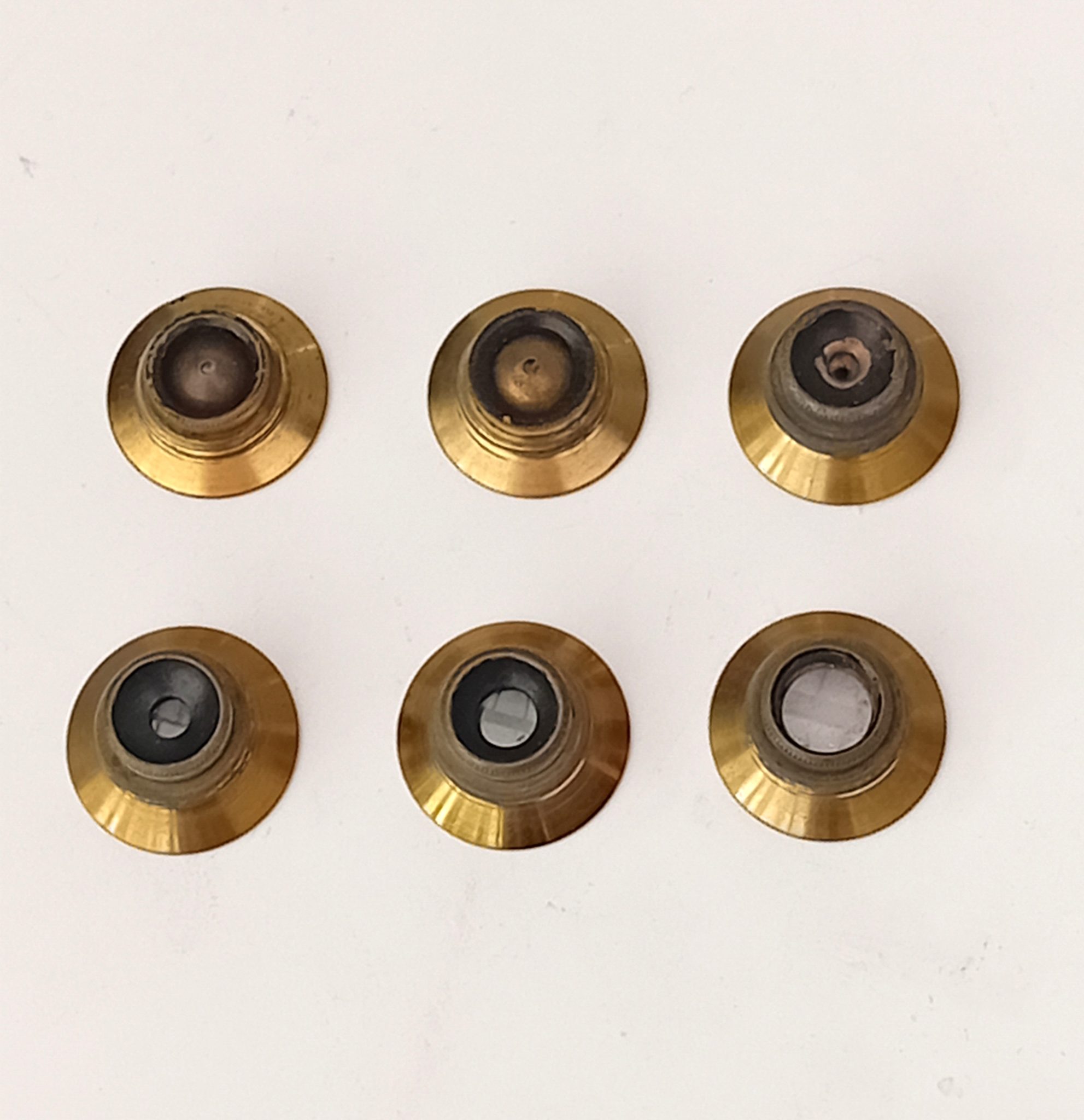 Set of six microscope objectives for an early compound microscope.